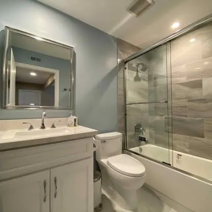 Bathroom vanity, tile, and shower renovation details from Travis Scott Construction